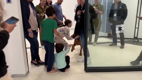 Thumbnail for Some released Israeli child hostages seeing their dog for the first time since they returned to Israel