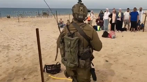 Thumbnail for Israeli soldiers helping Palestinian civilians in Gaza
